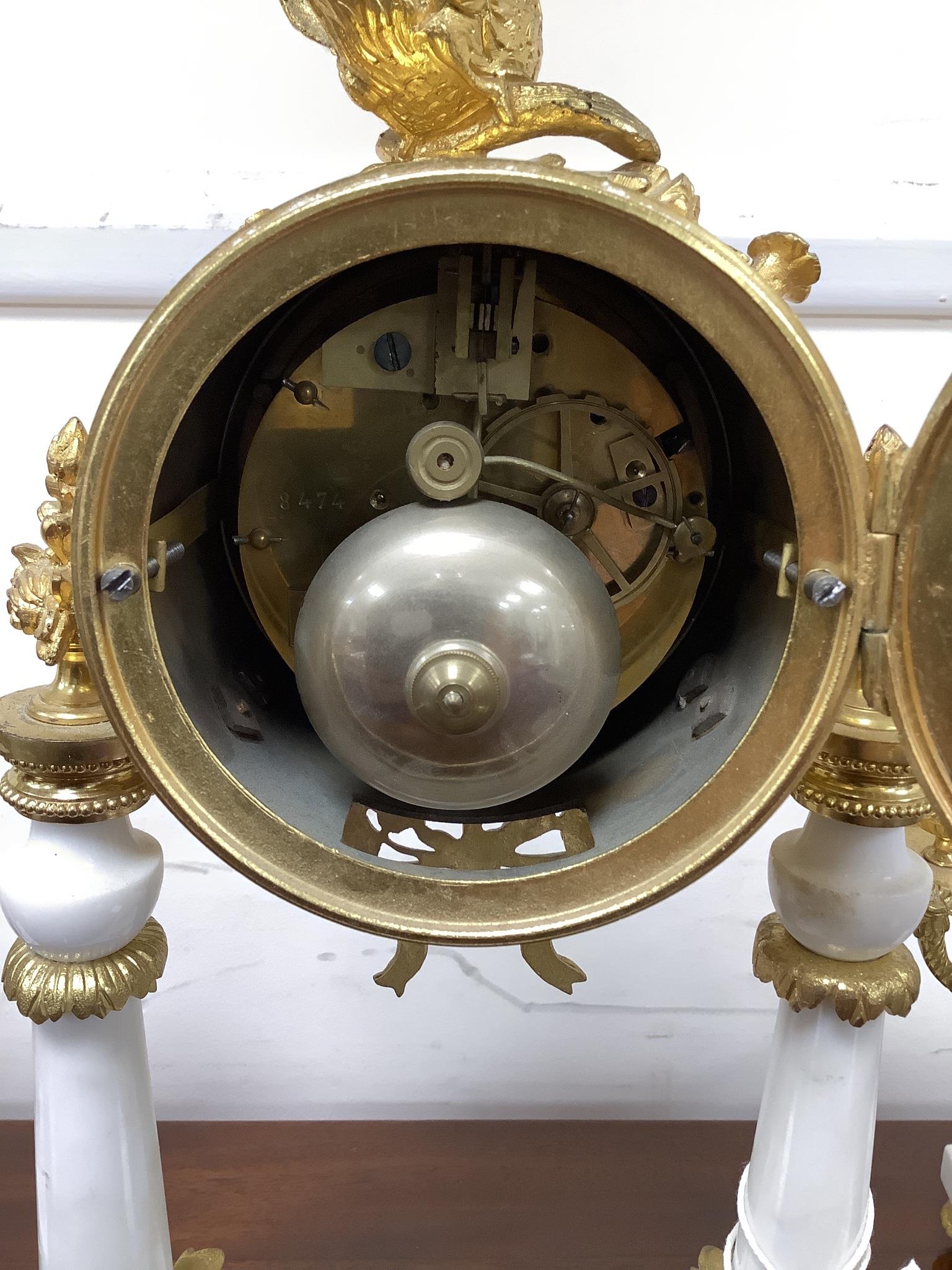 A French white marble and ormolu clock garniture, c.1900, no pendulum